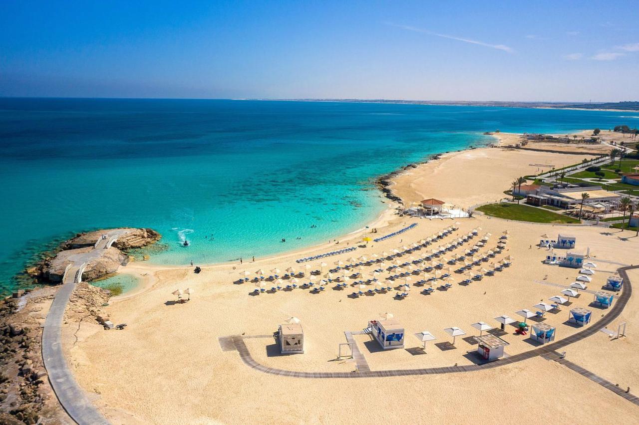 Rixos Alamein - Full Board Plus El Alamein Esterno foto Aerial view of the beach