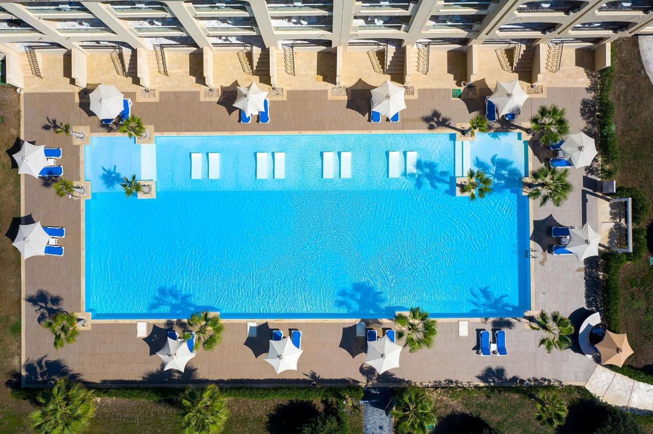 Rixos Alamein - Full Board Plus El Alamein Esterno foto Aerial view of the pool at the Hilton Mauritius Resort