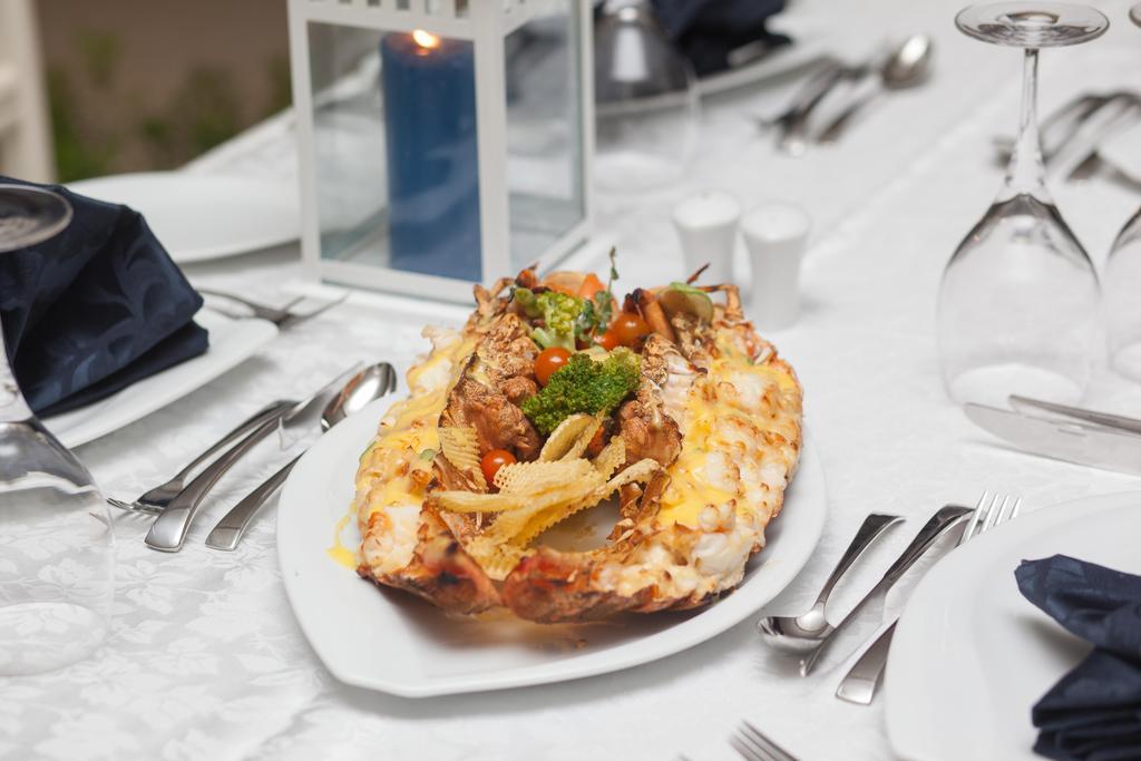 Rixos Alamein - Full Board Plus El Alamein Esterno foto A lobster prepared in the New England style