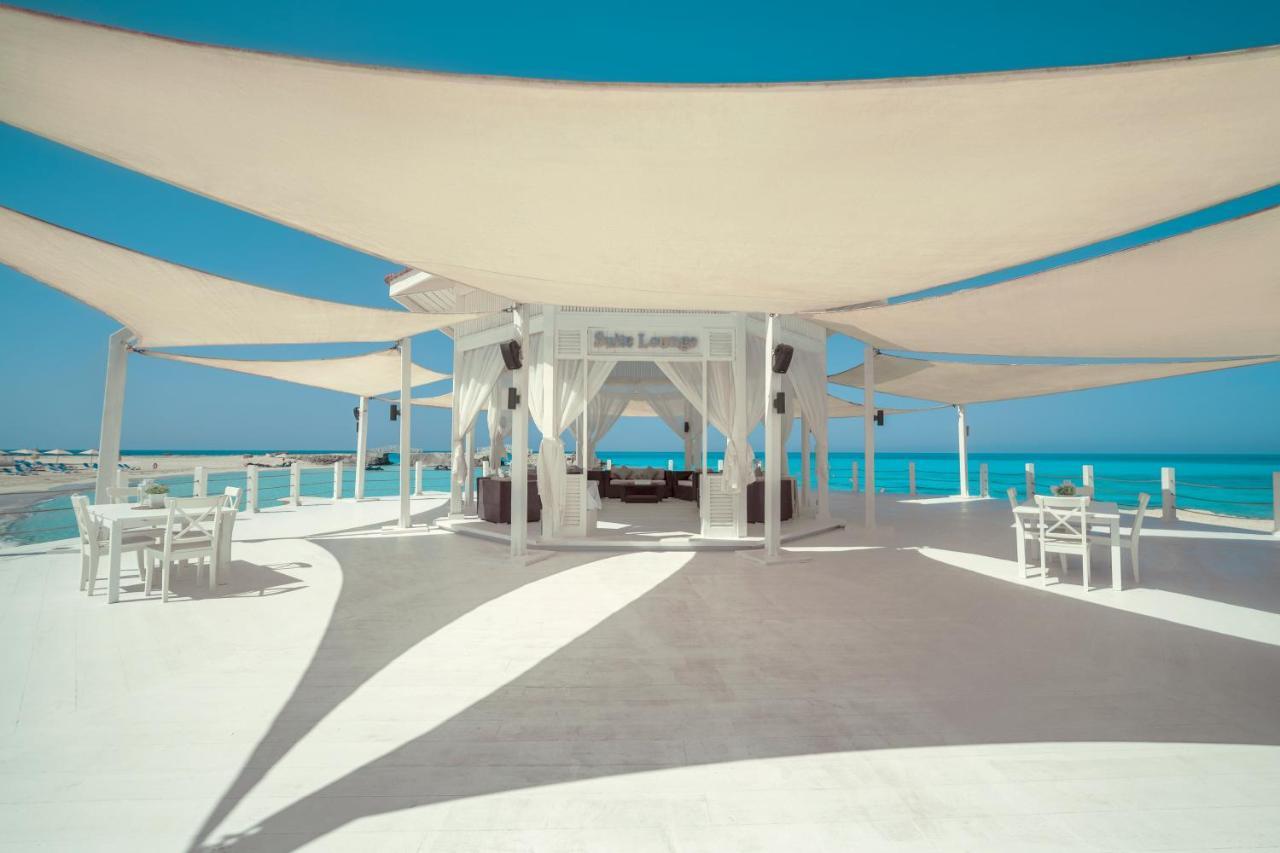 Rixos Alamein - Full Board Plus El Alamein Esterno foto The beach club at the resort